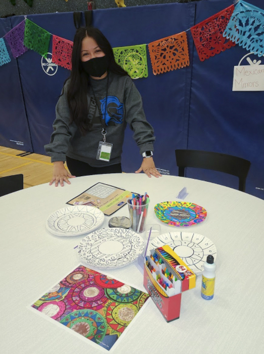 Staff at art table