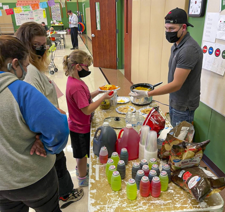 Family being served food