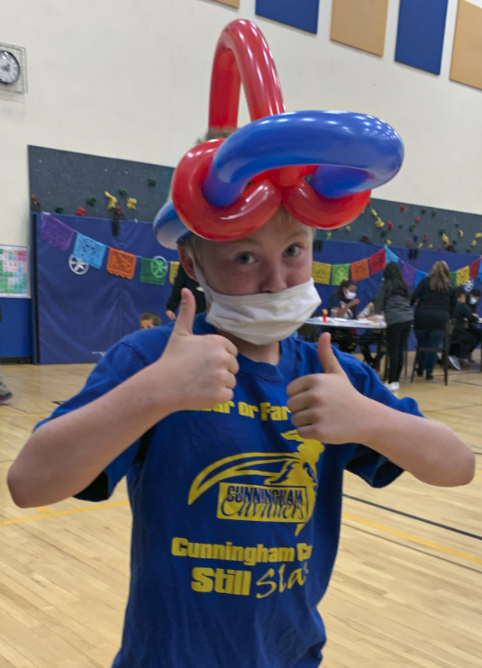 Student giving a thumbs up