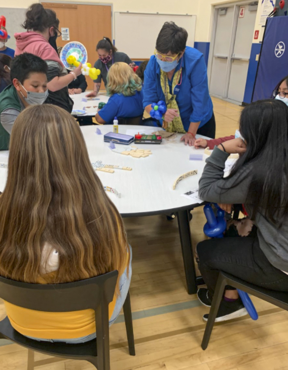 Students playing dominos