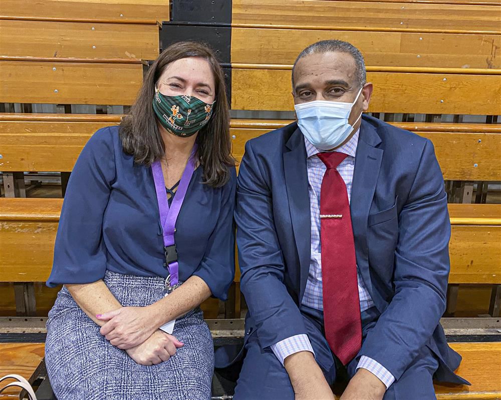 Woman and man posing for a picture together