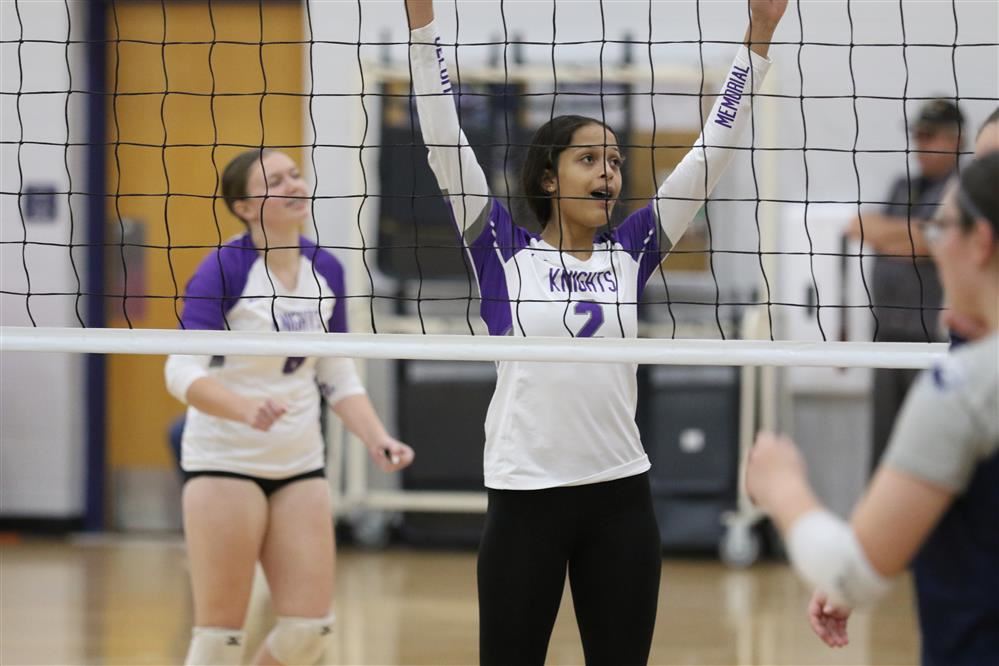  BMHS grills volleyball player at the net