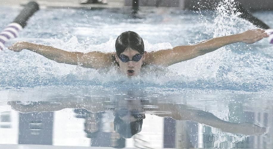  Laila Lee swimming free style in a swim meet