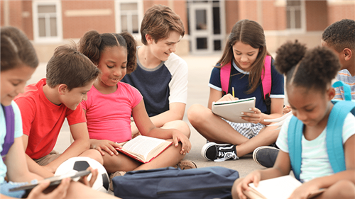Students reading together Students reading together